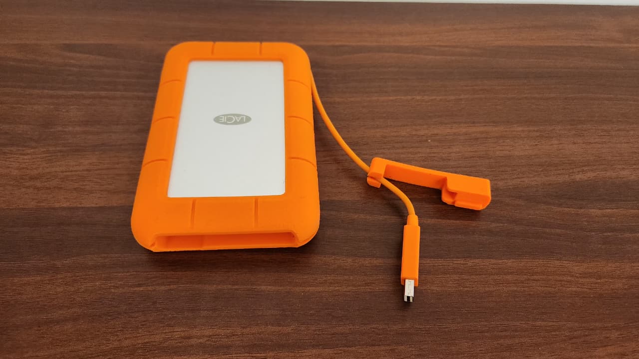 WhatsApp Image 2025-09-09 at 1.39.47 AM LaCie Slim LRD0TU1 External 2.5" 2TB USB 3.0 Thunderbolt Hard Drive HDD