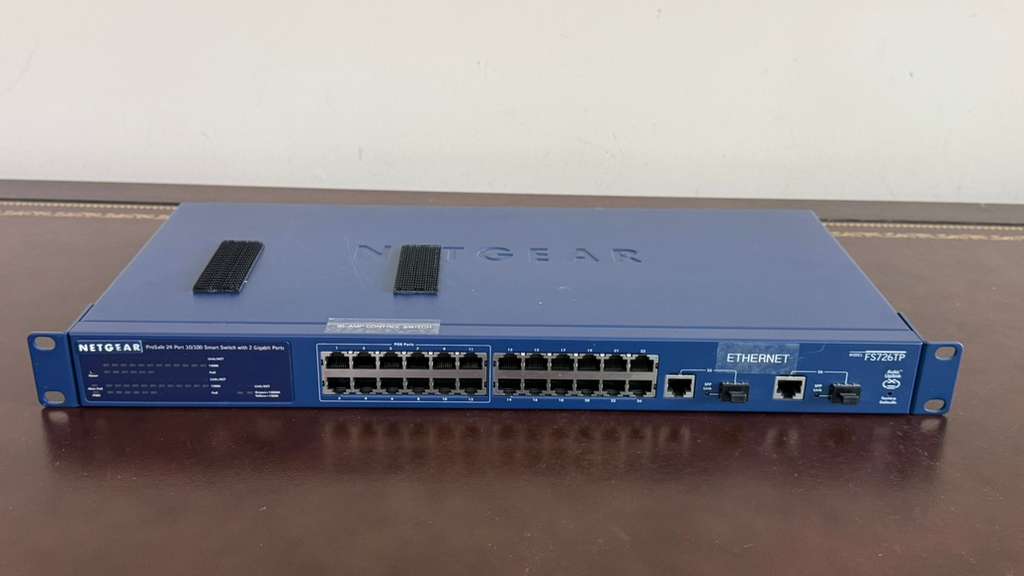 WhatsApp Image 2026-05-25 at 8.35.28 PM (1) NETGEAR FS726TP ProSafe 24+2 Smart Switch with PoE 24-Port 10/100 + Gigabit USA Pre-Owned